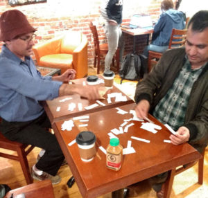 photo of two men at a table