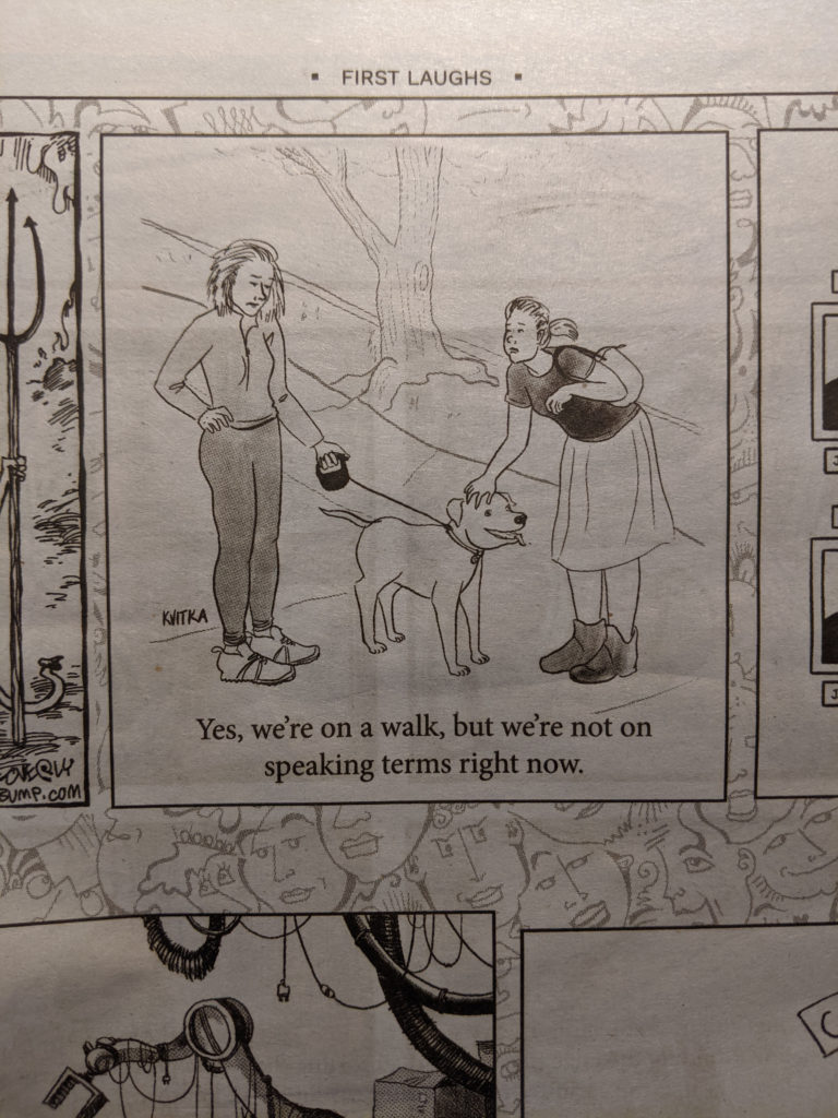 Close up of newspaper page showing a cartoon by Theora. Cartoon depicts a woman stopping to pet a goofy-looking dog on a leash. The dog's owner is saying, "Yes, we're on a walk, but we're not on speaking terms right now."